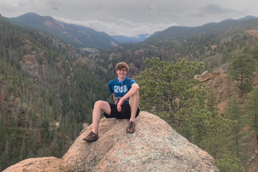 Joshua Hartl on a mountain in Colorado.