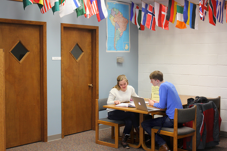 Luther College students sitting in a study area in the Language Learning Center.