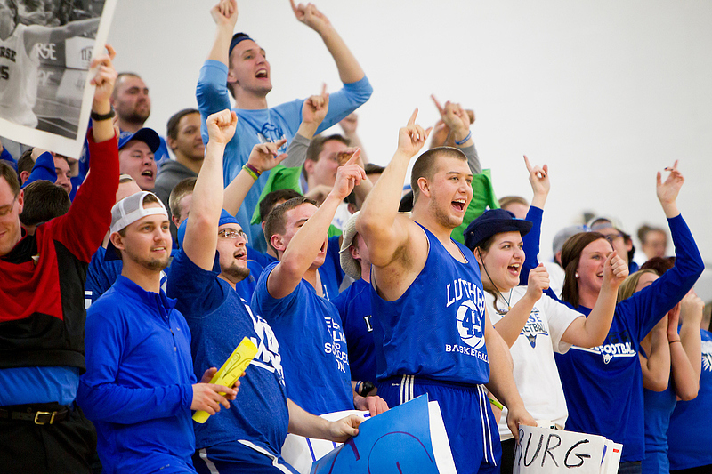 Luther students show up to support the Women's Basketball team in blue