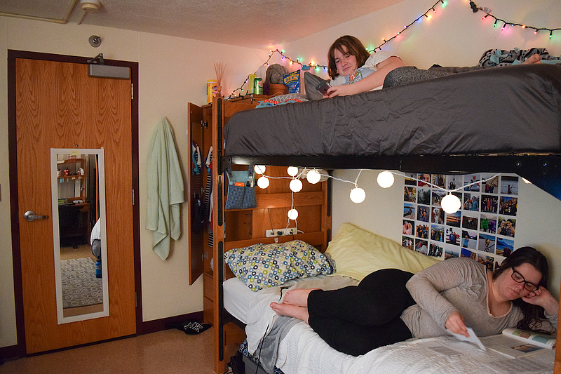 students use their dorm to study and use phone